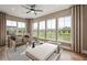 Relaxing sunroom with ample natural light and comfortable seating at 5505 Julep Ct, Cumming, GA 30028