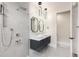 Elegant bathroom with double vanity and frameless shower at 192 East Lake Se Ter, Atlanta, GA 30317