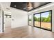 Spacious bedroom with private balcony access and hardwood floors at 192 East Lake Se Ter, Atlanta, GA 30317