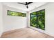 Well-lit bedroom with hardwood floors and large windows at 192 East Lake Se Ter, Atlanta, GA 30317
