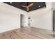 Light filled bedroom with hardwood floors and ceiling fan at 192 East Lake Se Ter, Atlanta, GA 30317