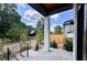 Covered porch with white columns and a view of a residential street at 192 East Lake Se Ter, Atlanta, GA 30317