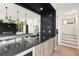 Modern kitchen with island, stainless steel appliances, and dark countertops at 192 East Lake Se Ter, Atlanta, GA 30317