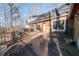Spacious wooden back deck with surrounding wooded views at 633 Duncan Rd, Oxford, GA 30054
