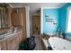 Bathroom with a garden tub and double vanity at 633 Duncan Rd, Oxford, GA 30054