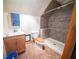 Small bathroom with shower, toilet, and vanity at 633 Duncan Rd, Oxford, GA 30054