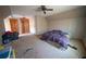 Primary bedroom with wood doors and a double bed at 633 Duncan Rd, Oxford, GA 30054