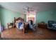 Spacious bedroom with wood flooring and ceiling fan at 633 Duncan Rd, Oxford, GA 30054