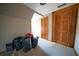 Room with wood doors and an air purifier at 633 Duncan Rd, Oxford, GA 30054