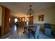 Bright dining area with hardwood floors and view into kitchen at 633 Duncan Rd, Oxford, GA 30054
