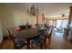 Spacious dining room with hardwood floors and a chandelier at 633 Duncan Rd, Oxford, GA 30054