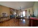 Formal dining room with hardwood floors and elegant chandelier at 633 Duncan Rd, Oxford, GA 30054