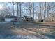 Ranch home with attached garage and spacious yard on wooded lot at 633 Duncan Rd, Oxford, GA 30054