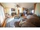 Spacious living area with hardwood floors, fireplace and large windows at 633 Duncan Rd, Oxford, GA 30054