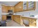 Modern kitchen with ample cabinetry and built-in desk at 895 Dogwood Park Dr, Lawrenceville, GA 30046