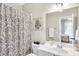 Clean bathroom with shower/tub combo and updated vanity at 1037 Emory Parc Pl, Decatur, GA 30033