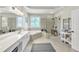 Bathroom with soaking tub, walk-in shower, and double vanity at 1037 Emory Parc Pl, Decatur, GA 30033