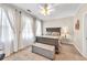 Comfortable bedroom with neutral decor and ample window light at 1037 Emory Parc Pl, Decatur, GA 30033