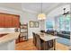 Bright dining area with marble table and built-in shelving at 1037 Emory Parc Pl, Decatur, GA 30033