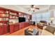 Spacious Gathering room with built-in bookcases and hardwood floors at 1037 Emory Parc Pl, Decatur, GA 30033