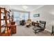 Comfortable office with built-in shelving and two armchairs at 1037 Emory Parc Pl, Decatur, GA 30033