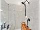 Modern shower with glass enclosure, tiled walls, and built-in seat at 1037 Emory Parc Pl, Decatur, GA 30033