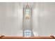 View of a bright stairwell with a large chandelier at 1037 Emory Parc Pl, Decatur, GA 30033
