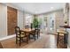 Spacious dining area with exposed brick wall and French doors at 217 Westminster Dr, Atlanta, GA 30309