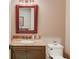 Small bathroom with granite vanity and updated fixtures at 922 Little Darby Ln, Suwanee, GA 30024