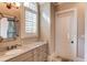 Bathroom with granite countertops and updated fixtures at 922 Little Darby Ln, Suwanee, GA 30024