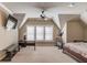 Spacious bedroom with high ceiling, large windows, and exercise bike at 922 Little Darby Ln, Suwanee, GA 30024