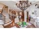Breakfast room with view of kitchen and staircase at 922 Little Darby Ln, Suwanee, GA 30024