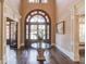Two-story entry with hardwood floors & chandelier at 922 Little Darby Ln, Suwanee, GA 30024