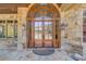 Elegant double front doors with arched transom at 922 Little Darby Ln, Suwanee, GA 30024