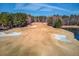 Golf course with sand traps and water features at 922 Little Darby Ln, Suwanee, GA 30024