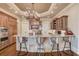Gourmet kitchen with granite countertops and custom cabinetry at 922 Little Darby Ln, Suwanee, GA 30024