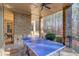 Outdoor patio with ping pong table and wooded views at 922 Little Darby Ln, Suwanee, GA 30024