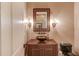 Powder room with dark vanity and vessel sink at 922 Little Darby Ln, Suwanee, GA 30024
