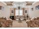 Bright sitting room with comfy seating and large windows at 922 Little Darby Ln, Suwanee, GA 30024