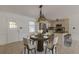 Kitchen dining area with table and chairs staged at 1946 Christian Se Cir, Conyers, GA 30013