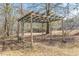 Wooden pergola with bench in backyard at 1946 Christian Se Cir, Conyers, GA 30013