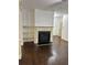 Living room with hardwood floors and a gas fireplace at 2249 Knoxhill Se Vw, Smyrna, GA 30082