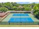 Two community tennis courts with basketball hoop at 485 Shelli Ln, Roswell, GA 30075