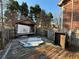 Partially damaged hot tub on the wooden deck at 3709 Charlotte Dr, Rex, GA 30273