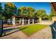 A charming pergola with seating area in a community setting at 4910 Crestline View Rd, Cumming, GA 30028