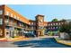 Multi-story retail building with clock tower at 4910 Crestline View Rd, Cumming, GA 30028