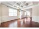 Formal dining room with hardwood floors, chandelier and wainscoting at 706 Independence Ln, Acworth, GA 30102