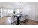 Bright dining room with hardwood floors and chandelier at 75 Mayson Ne Ave, Atlanta, GA 30307