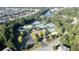 Aerial view of community, including pool, tennis courts, and homes at 558 Olympic Way, Acworth, GA 30102