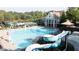 Large pool with water slide; tennis courts and clubhouse nearby at 558 Olympic Way, Acworth, GA 30102